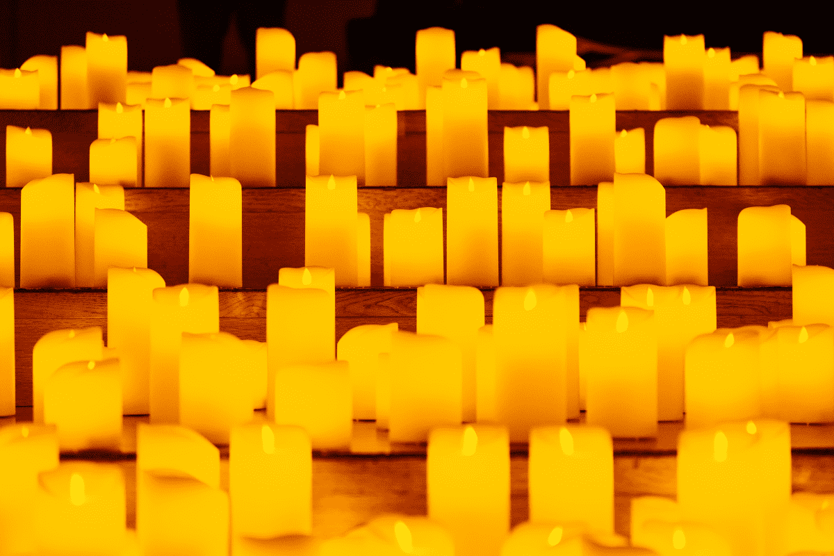 A sea of candles on some steps