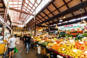 Inside of the Fremantle Markets - rows of fresh fruit and vegetables