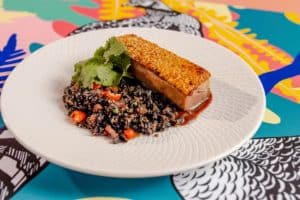 Crispy pork belly with rice and beans