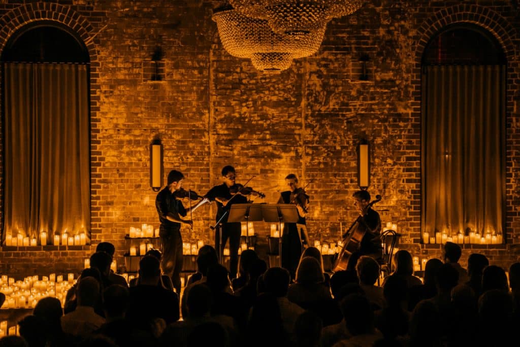 String quartet on stage at a Candlelight Concert 