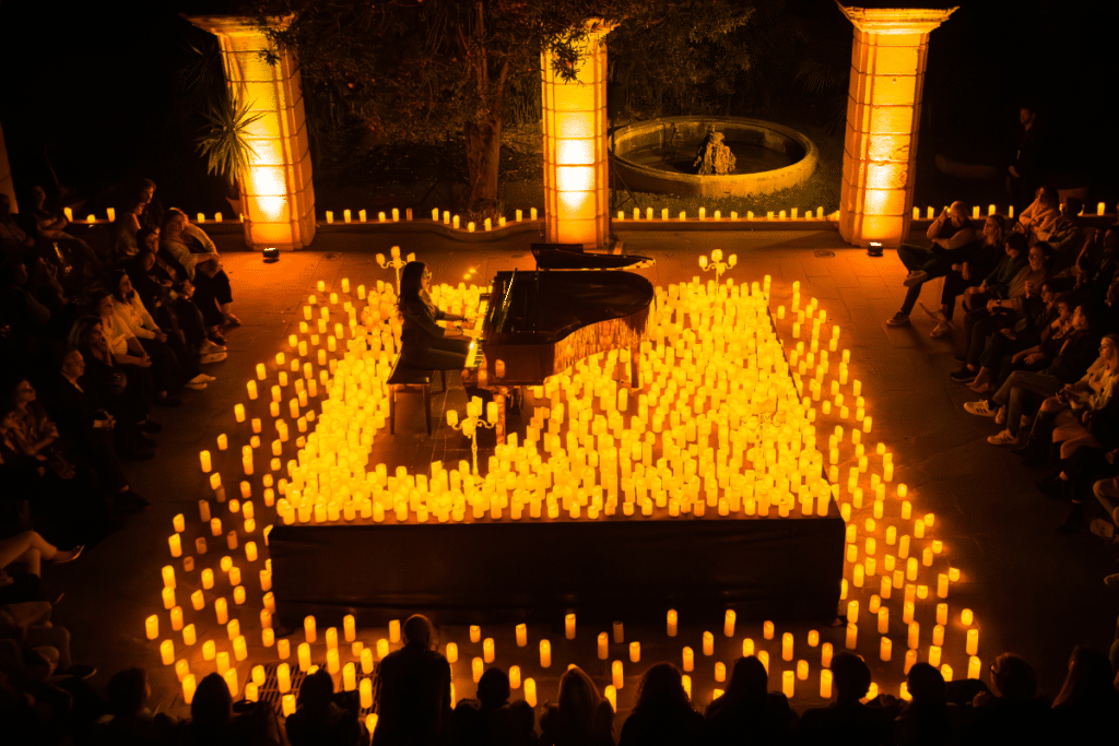 Pianist on stage at a Candlelight Concert